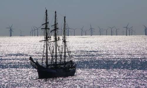 Ship with masts in the sea